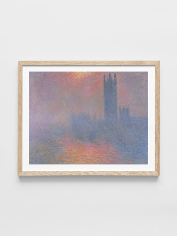 The Houses of Parliament, London, with the sun breaking through the fog