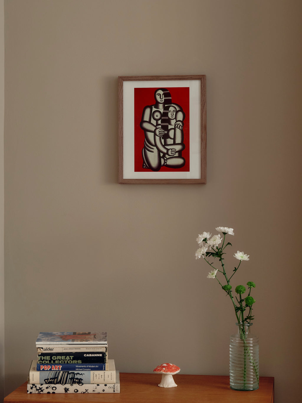 Two figures, naked on red bottom